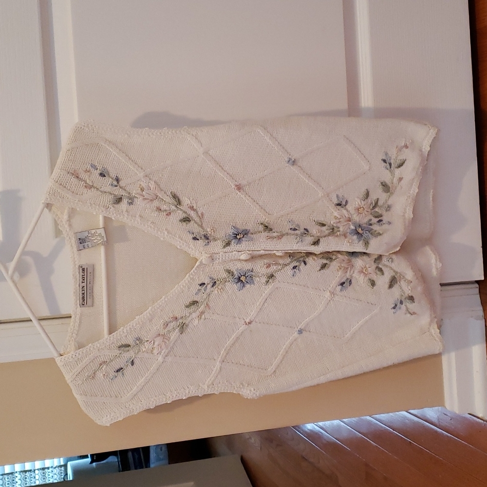 White vest with floral design